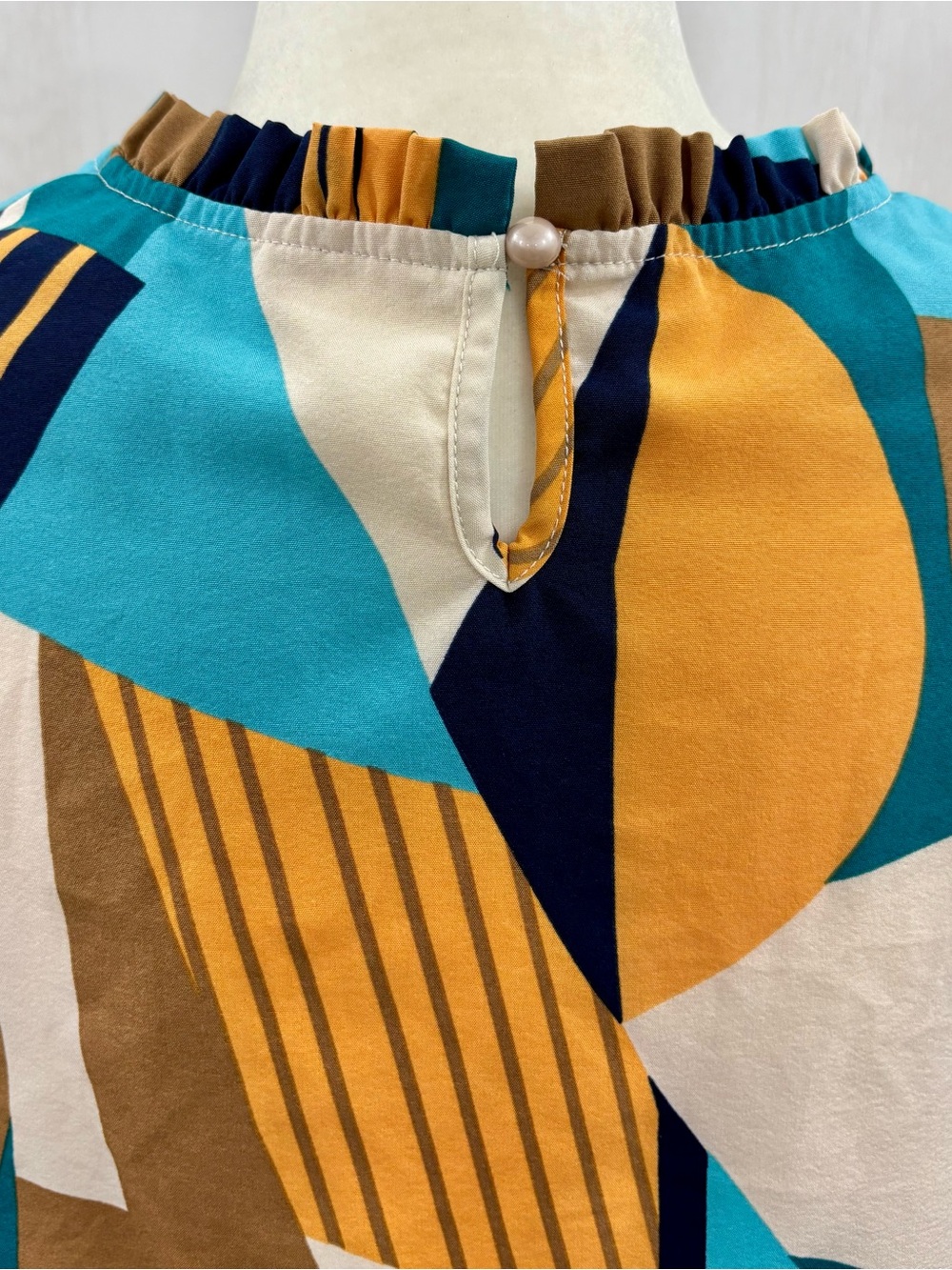 Geometric Pattern Ruffle Short Sleeve Blouse Blue Navy Orange Brown - Picture 4 of 5